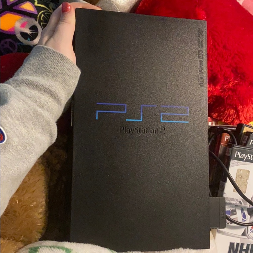PlayStation 2 and a ton of games
